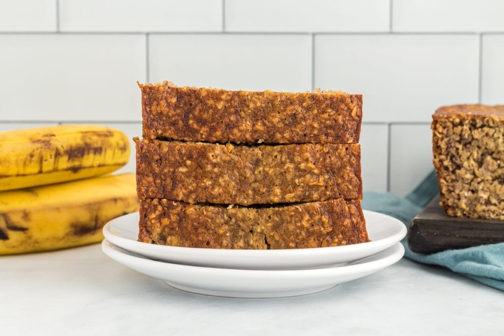 flourless banana bread slices on a white plate