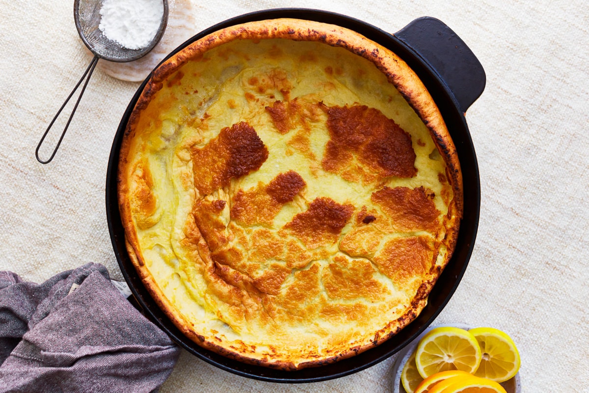 overhead view of a gluten-free dutch baby in a pan.