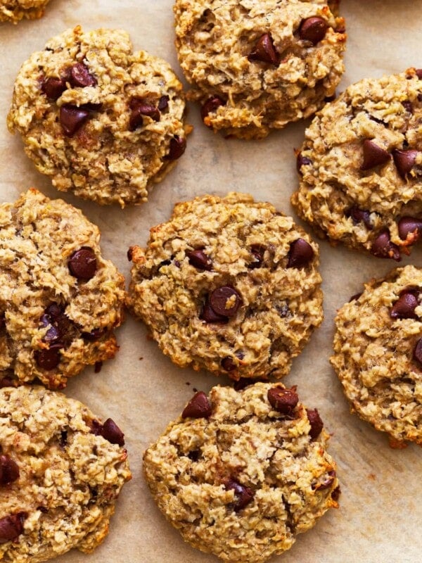 close up overhead view of banana oatmeal cookies on parchment paper.