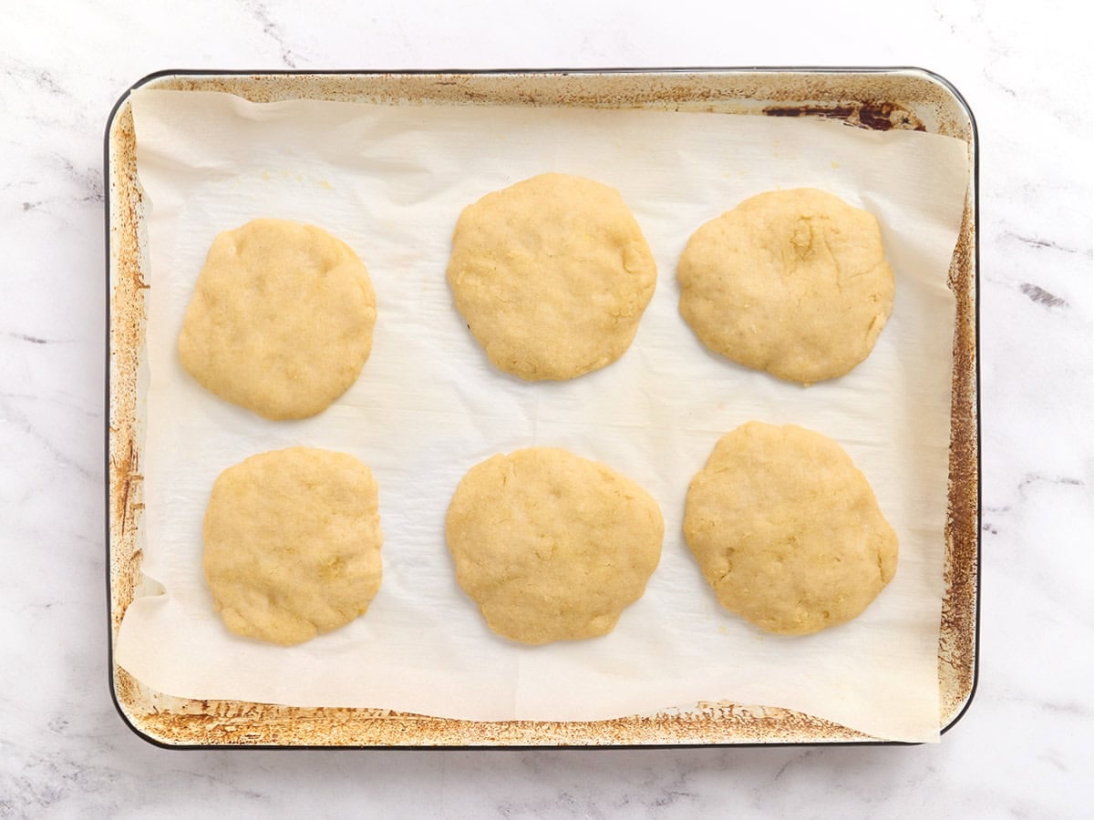 gluten-free pita bread dough divided, shaped and resting