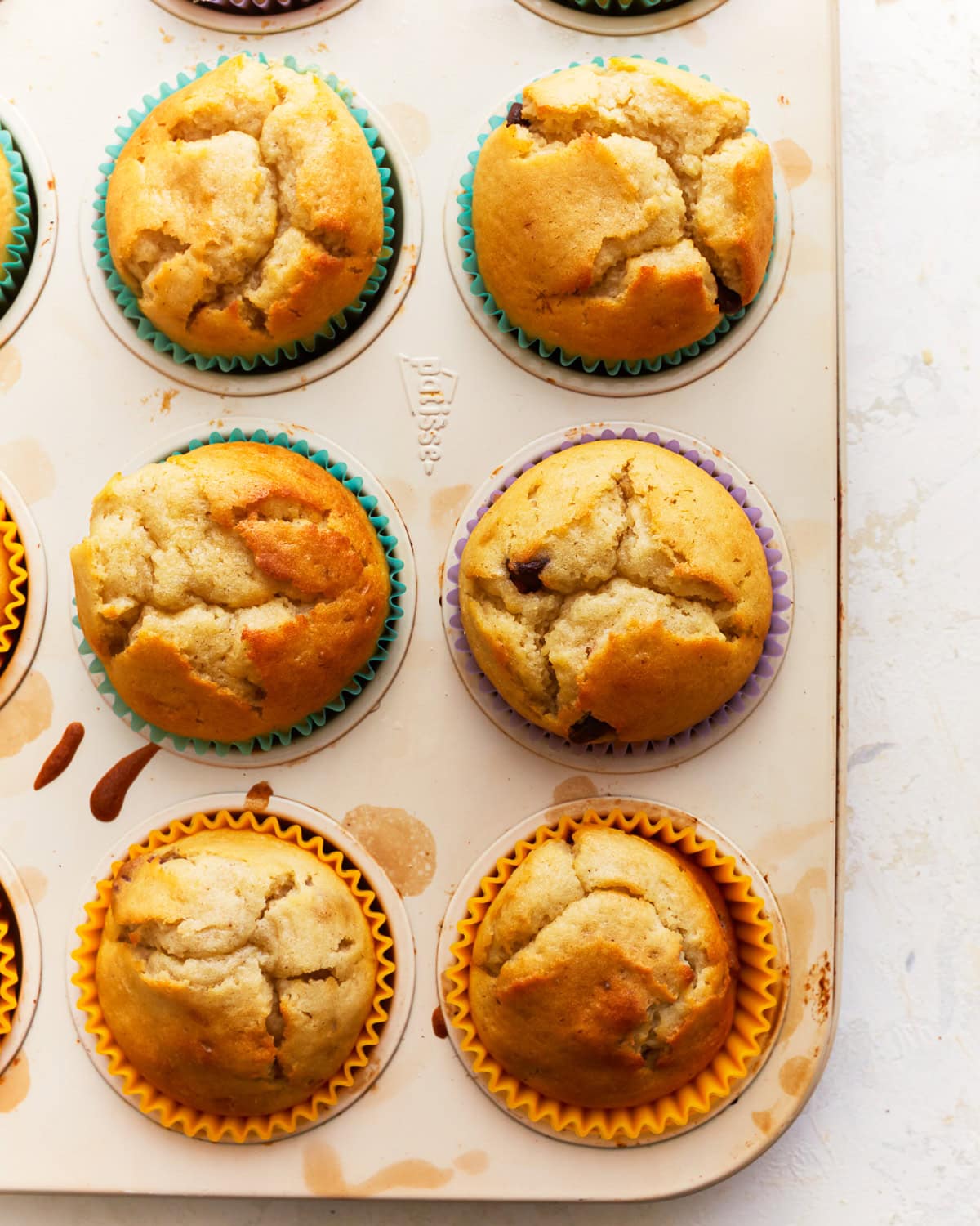 overhead view of gluten-free muffins in a muffin tin.