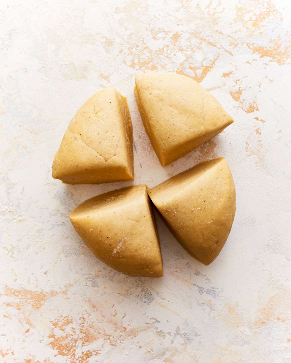 gluten-free pasta dough divided into 4 portions.
