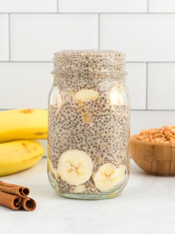 side view of banana chia pudding in a mason jar.