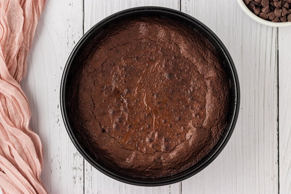 cooked flourless chocolate cake in 8-inch cake pan