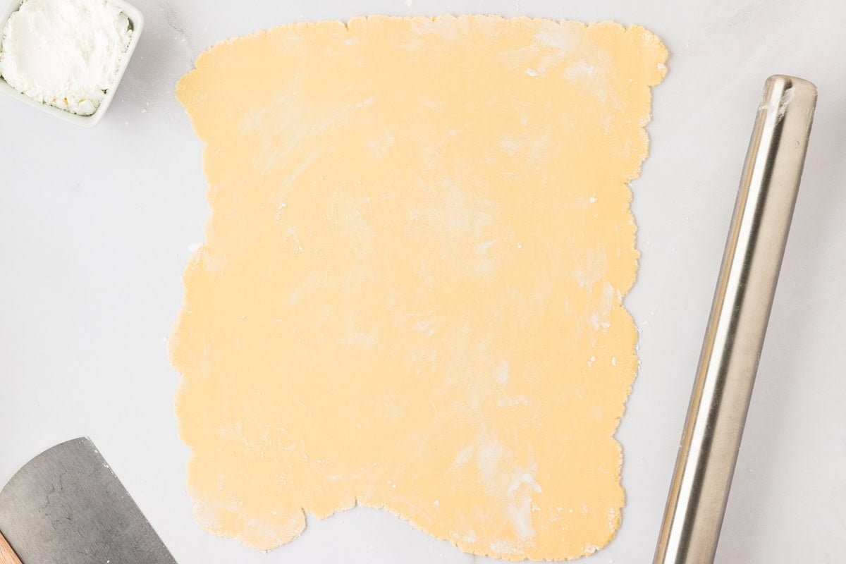 gluten-free egg roll dough rolled out into large rectangle