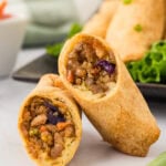 gluten-free egg roll cut in half pieces leaning on each other
