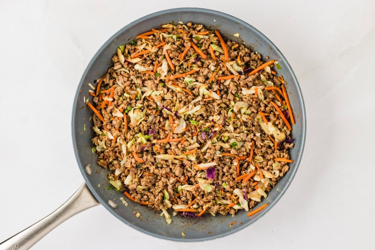 gluten-free egg roll filling cooked in a grey skillet
