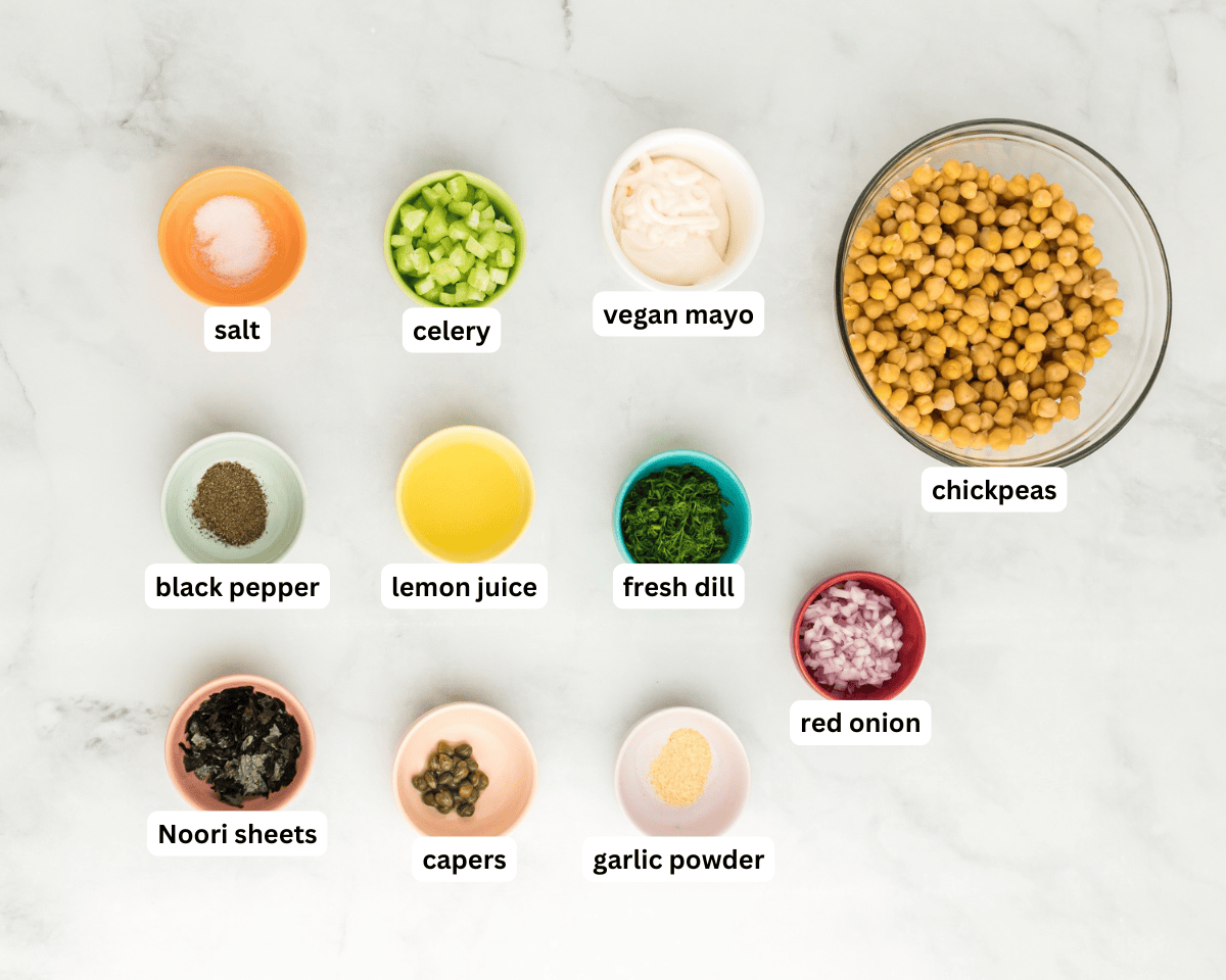 vegan chickpea tuna salad ingredients laid out on a light surface