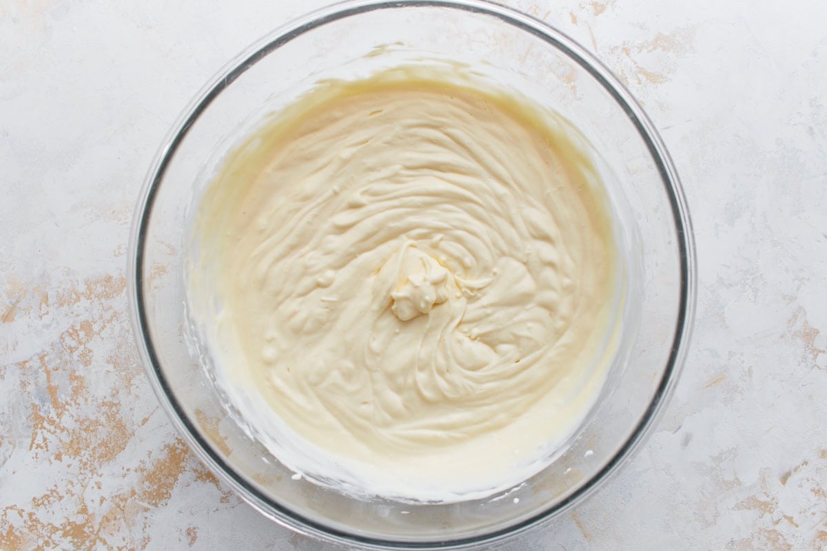 Silky, fully mixed keto cheesecake batter ready to be poured into the pan.