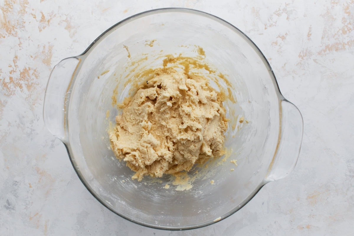The gluten-free snickerdoodle dough after mixing, thick and soft with a slightly sticky texture, ready for shaping.