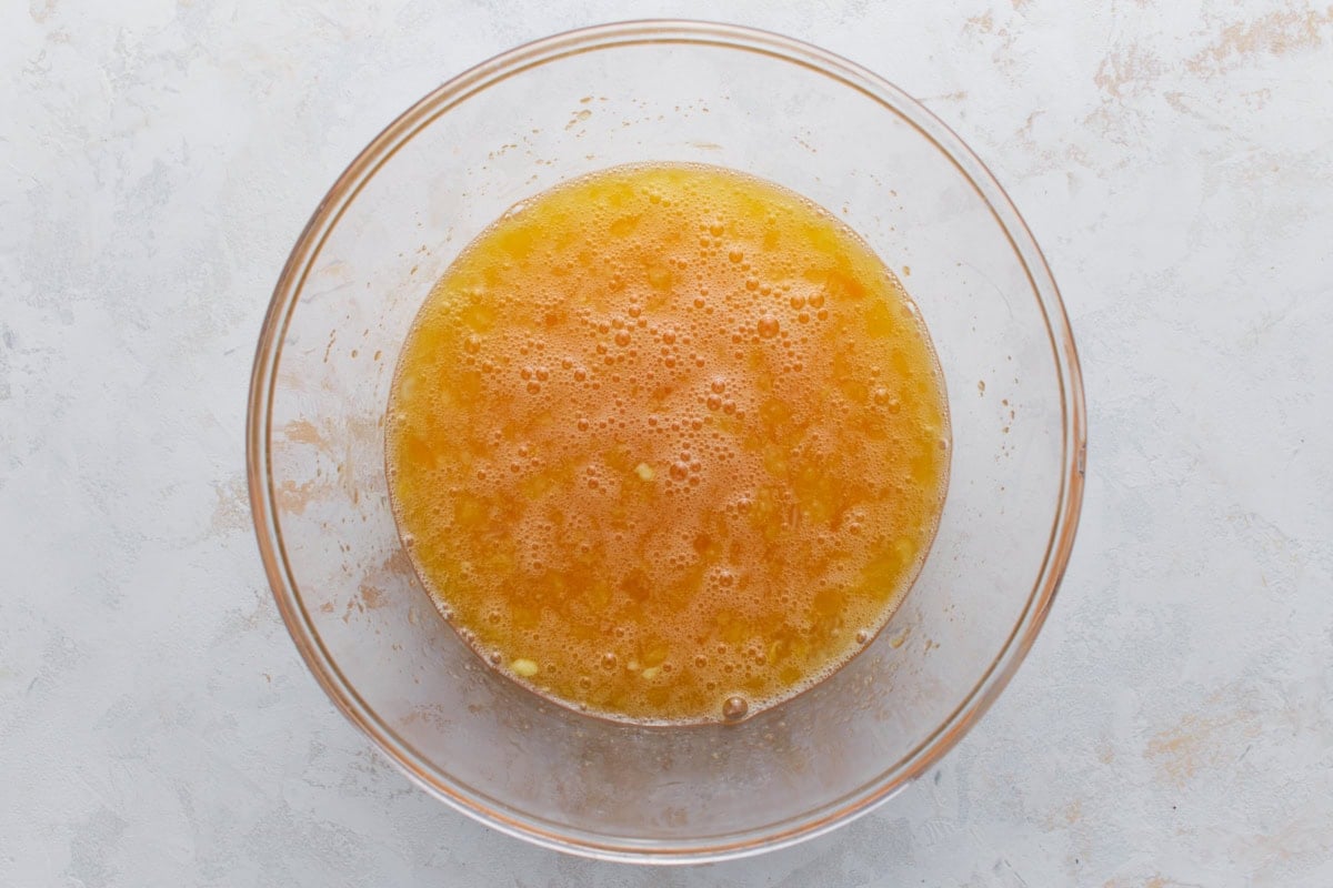 mixing the filling for crustless pecan pie