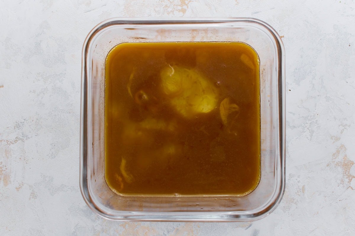 Egg mixture whisked together in a glass bowl before cooking