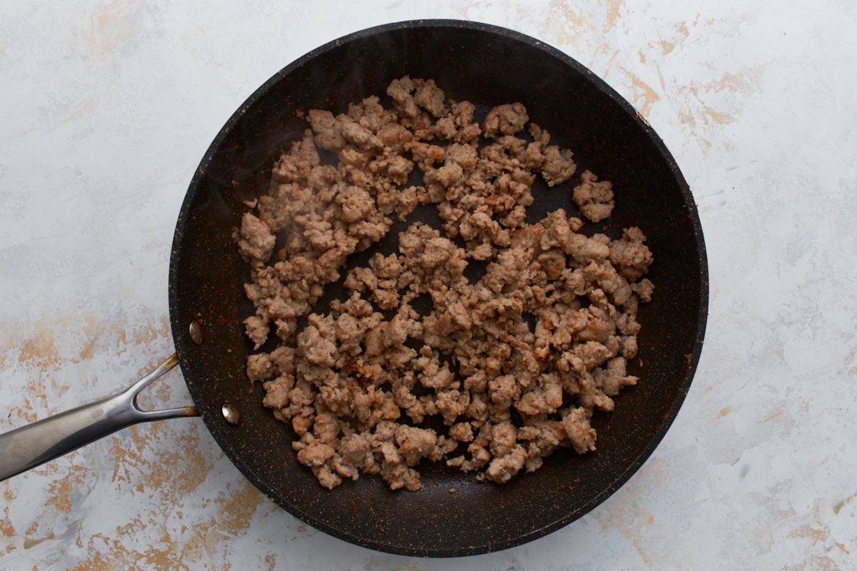 cooked sausage in a skillet