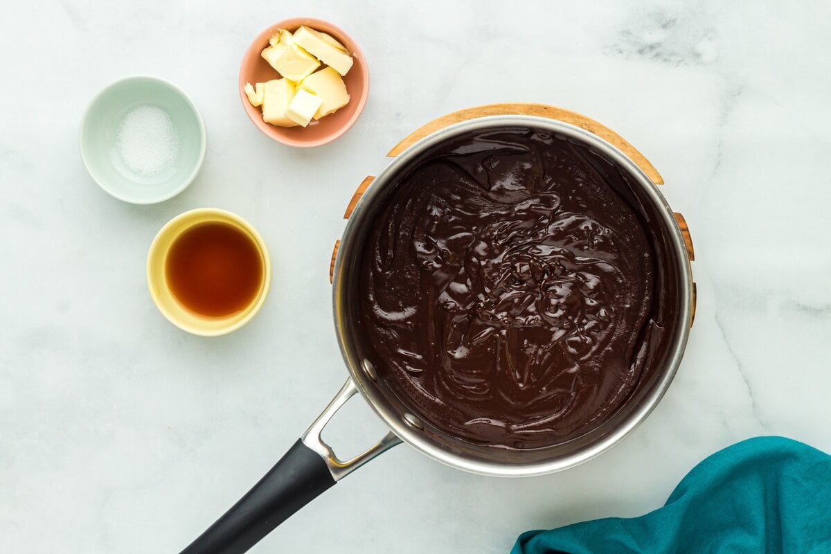 Smooth, thick chocolate custard filling finished with vanilla and salt in a saucepan.