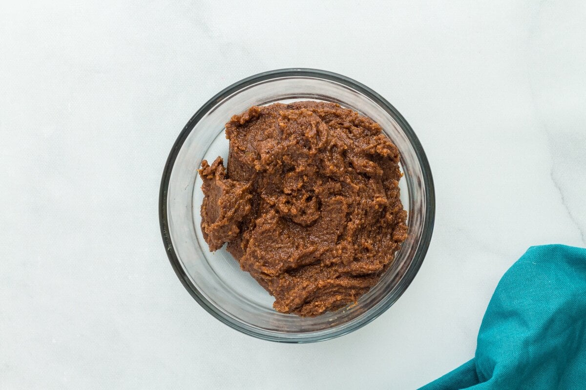 Cinnamon sugar filling mixture in a bowl, thick and spreadable.