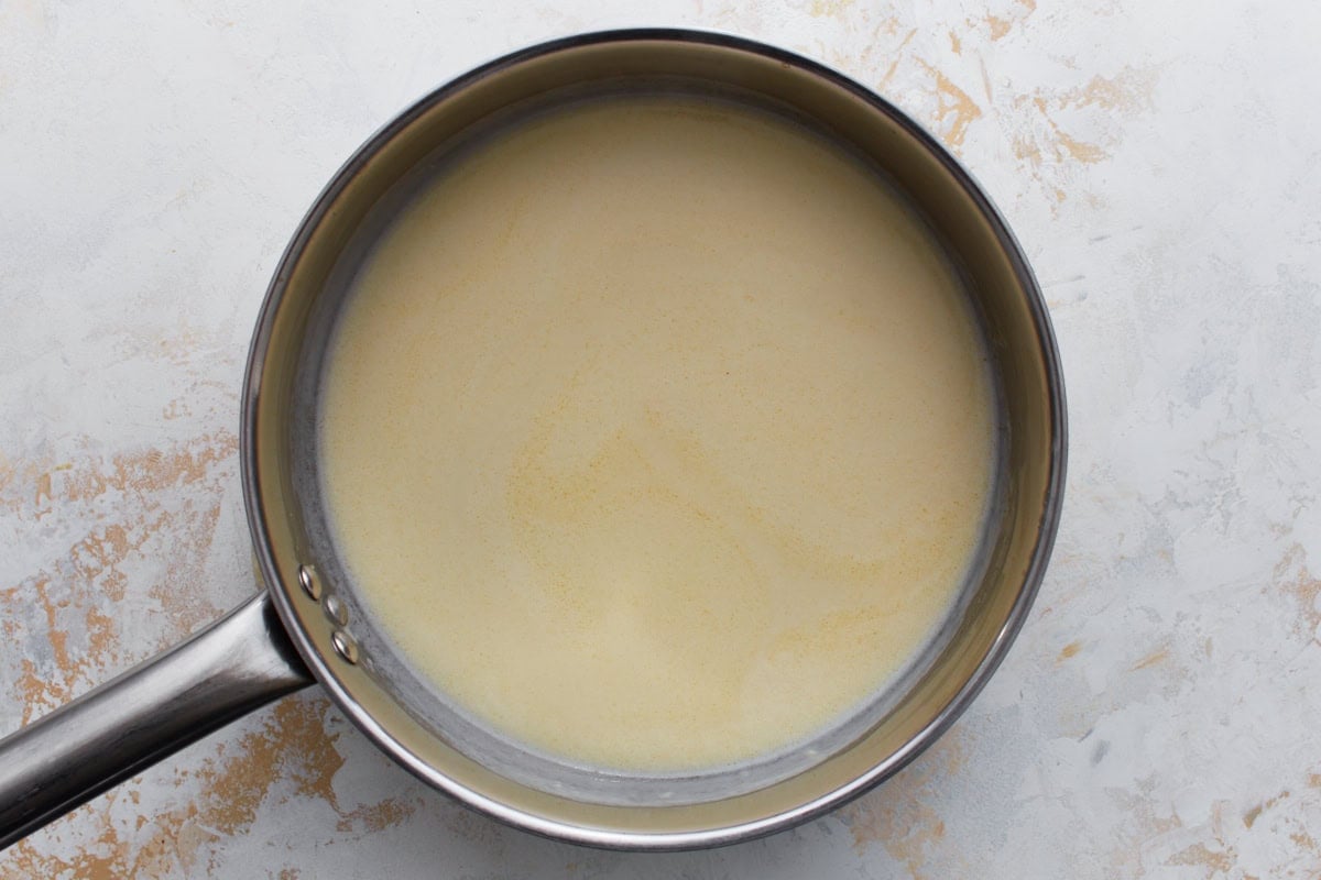 gluten free beer and milk combined with butter and flour to make gluten free beer cheese sauce