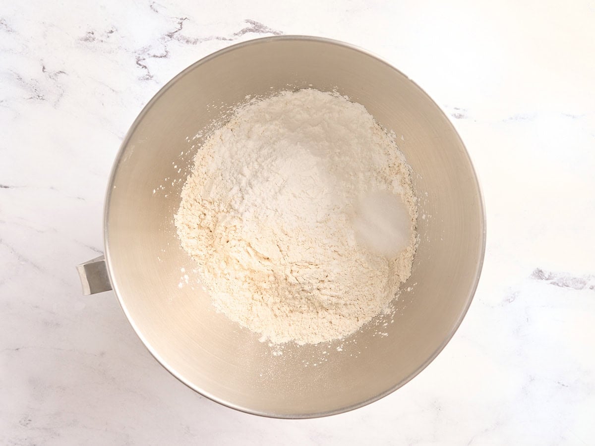 Gluten free bread flour, tapioca starch, and salt combined in a mixing bowl for gluten free challah bread.