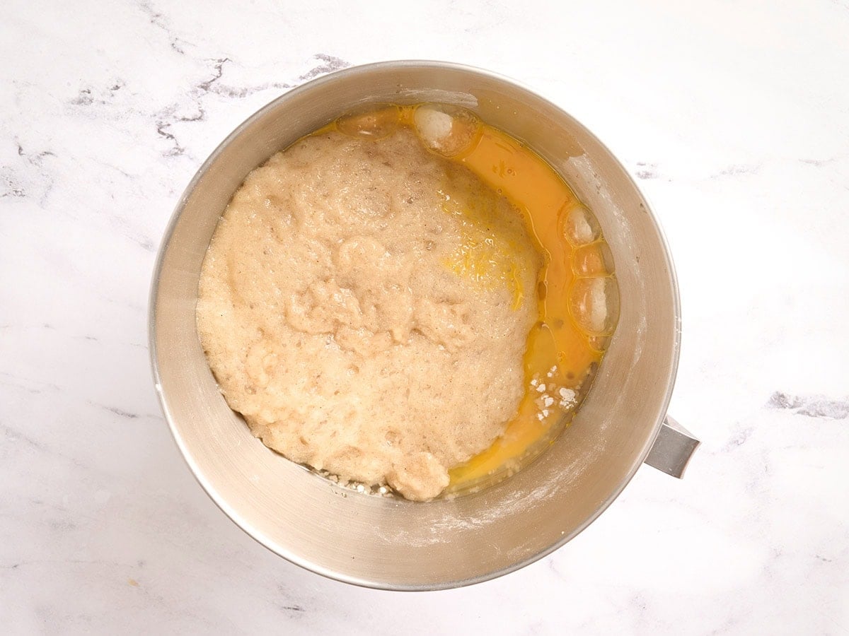 Eggs and yeast mixture added to the dry ingredients to make gluten free challah bread dough.