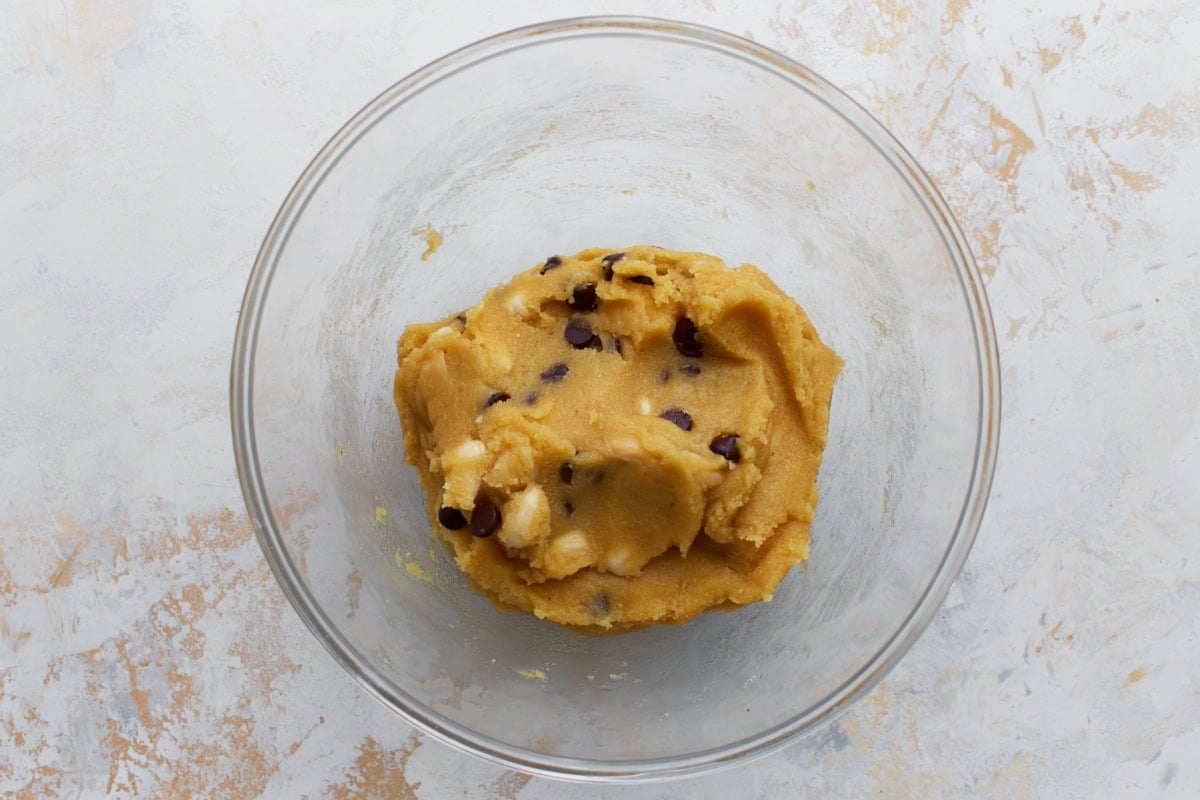 Almond flour biscotti dough with chocolate chips and sliced almonds folded in