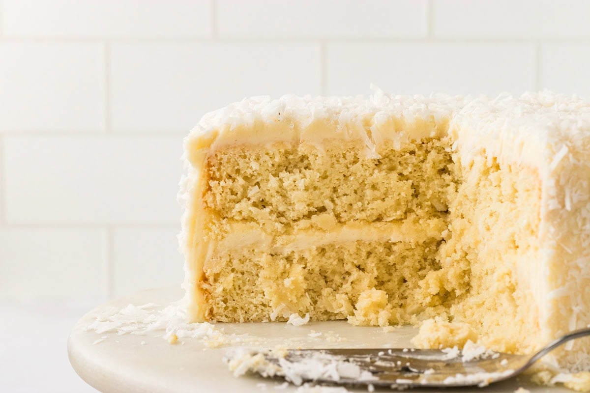 piece of gluten free coconut cake carved out