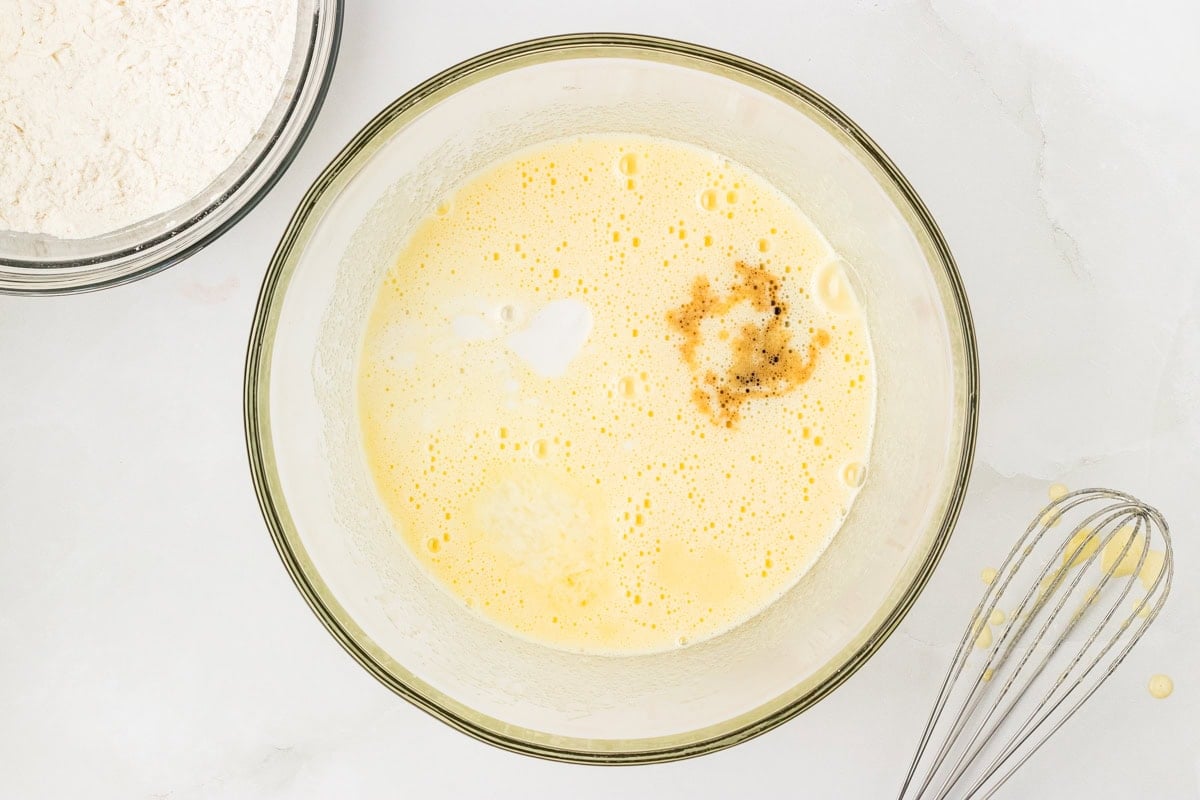 whisking cake batter together for gluten free coconut cake