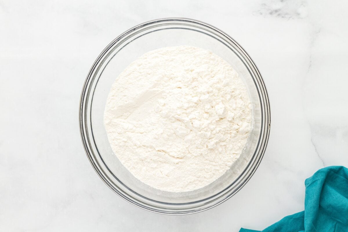 Freshly mixed homemade gluten free flour blend in a glass mixing bowl