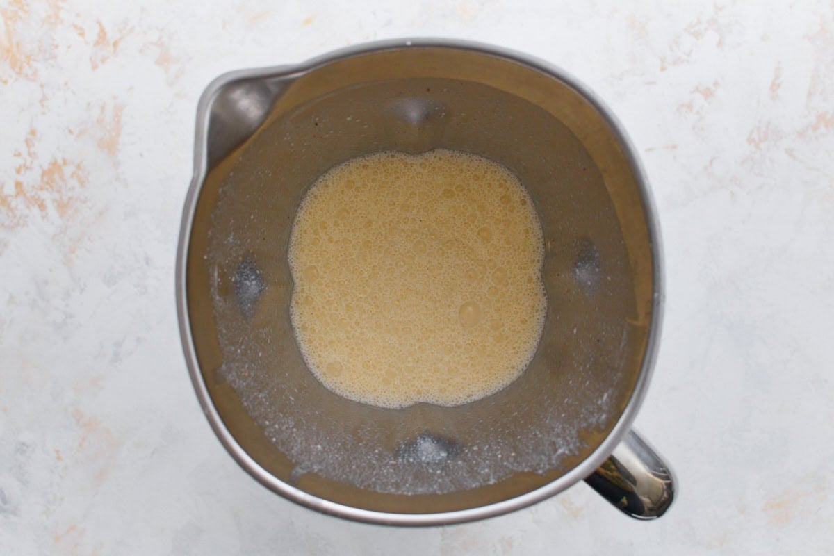 Blender filled with smooth custard pie mixture before baking