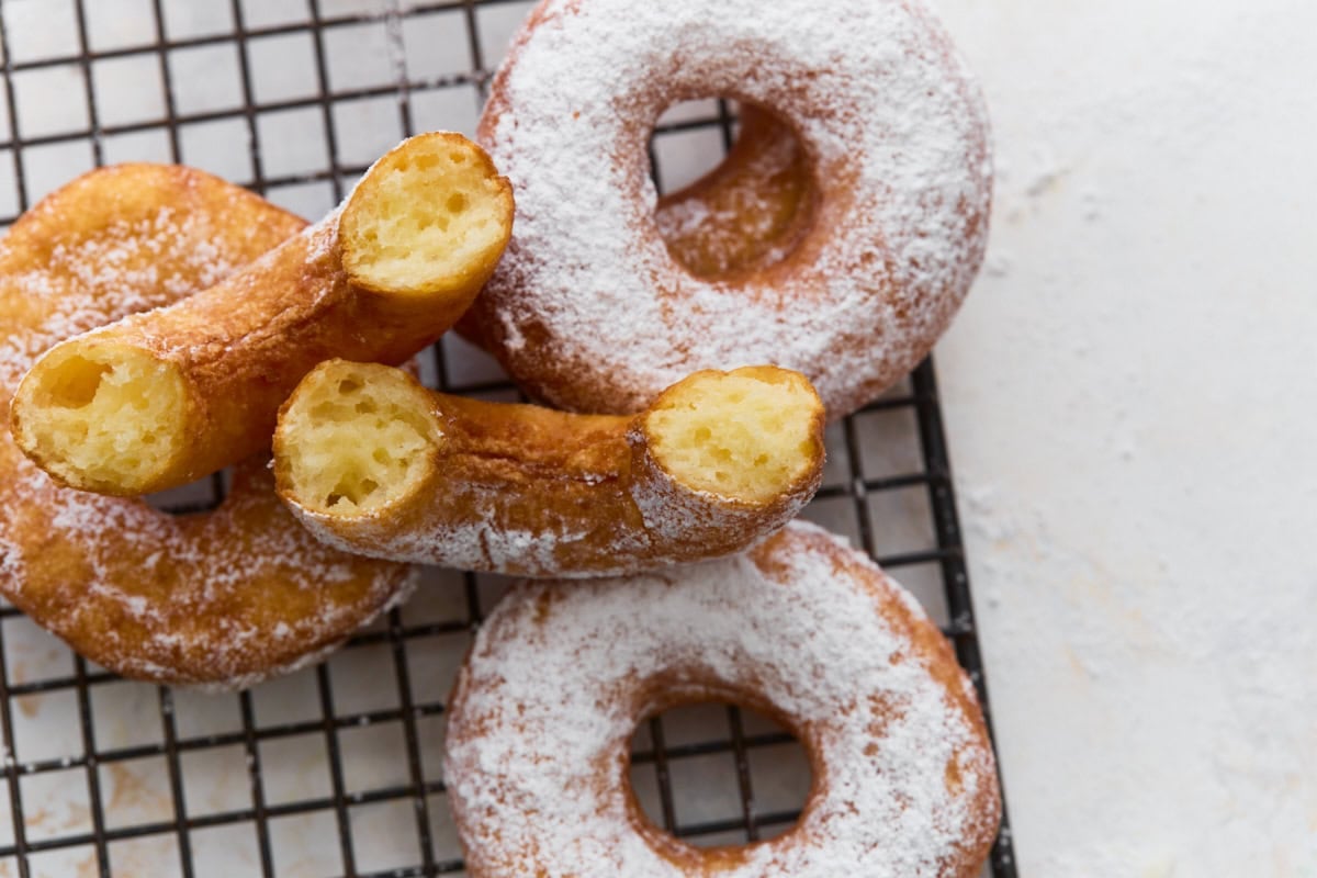 Gluten-free mochi donut cut open to show the soft and chewy center texture