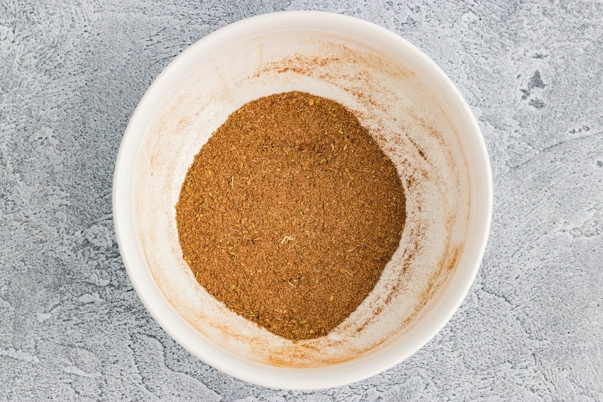 homemade gluten-free taco seasoning fully mixed together in a white bowl
