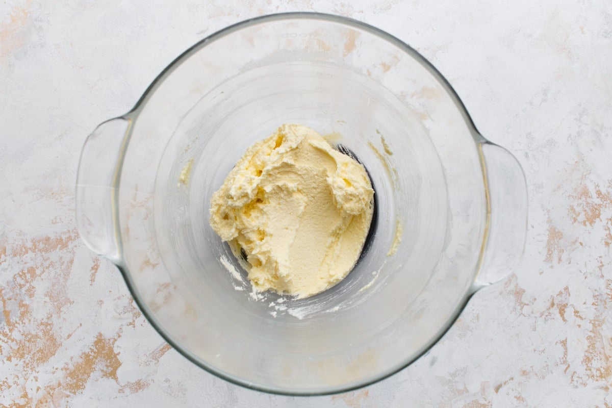Butter and sugar creamed until pale and fluffy in a glass mixing bowl